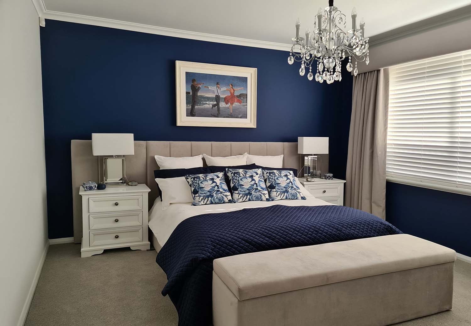 beach painting Moonlight Dancers hanging beautifully in a blue bedroom, an oil painting by Theo Michael
