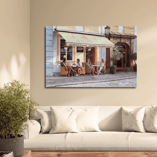 Original oil painting of an Italian restaurant  by Theo Michael. Diners enjoy a leisurely meal under the shade of a canopy. The cobblestone street and surrounding potted plants add to the charming European ambiance.