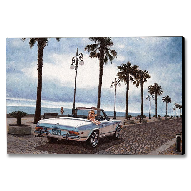 A rectangular canvas wall art print showing a beachside street scene with palm trees, vintage cars, and a blue sky, photographed against a plain white background.