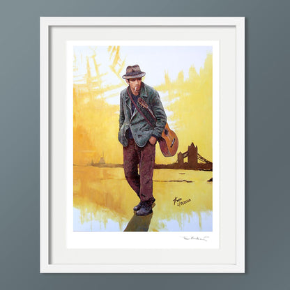 Fine Art print by Theo Michael. Bathed in warm, golden sepia tones, this evocative narrative reproduction blends London film noir sensibilities with soulful introspection. A brooding musician carrying a guitar slung across his back stands along the Thames, with Tower Bridge silhouetted against a softly glowing horizon.