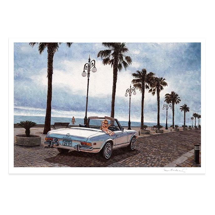 A square art print depicting a vintage convertible car parked on a seaside promenade lined with palm trees under a cloudy sky. The print is hand signed by Theo Michael.
