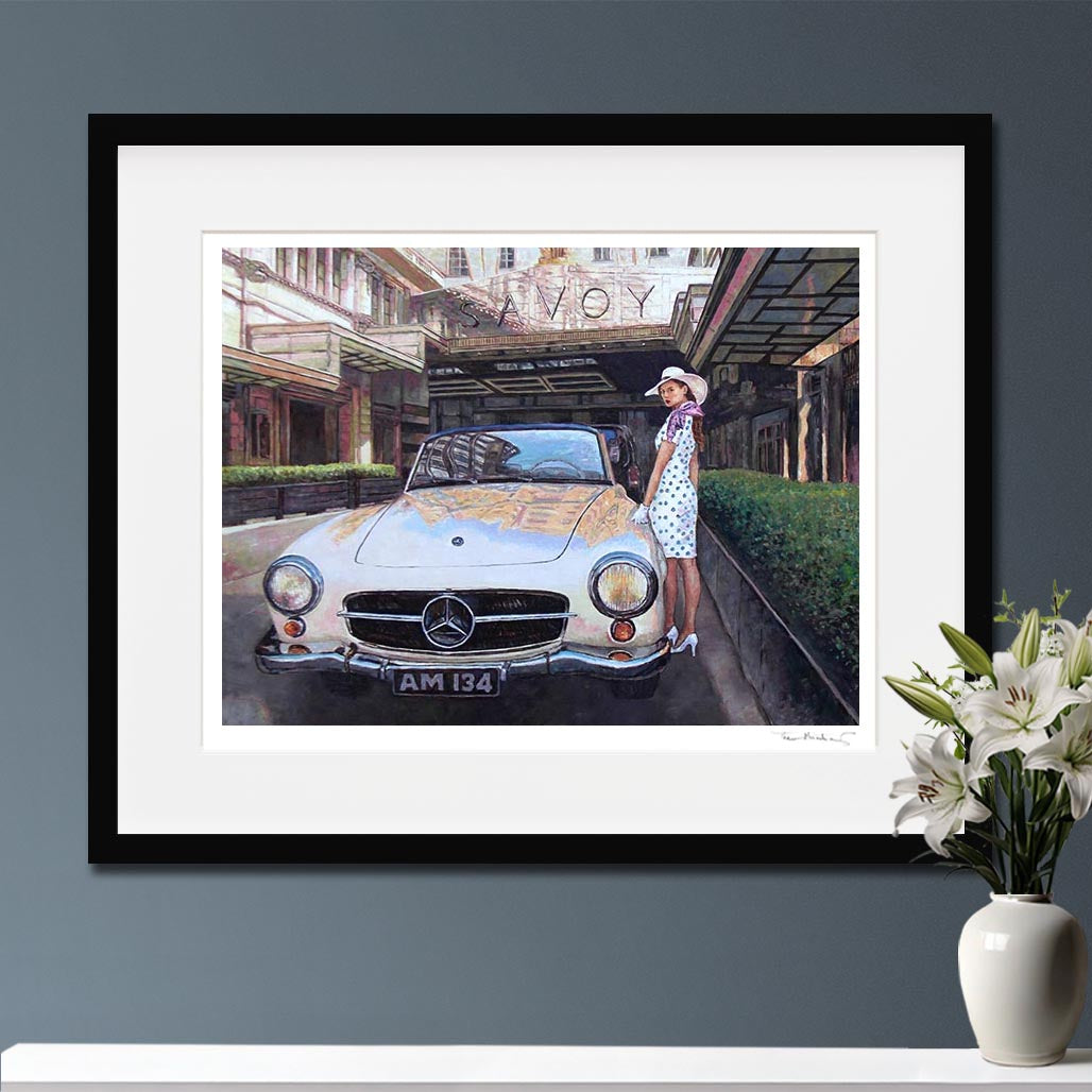 Bring home the timeless elegance of London with 'The Savoy' by Theo Michael. This high-quality hand signed fine art print features a classic Mercedes-Benz 190SL and a glamorous figure at the iconic Savoy Hotel entrance. Perfect for lovers of vintage cars, Art Deco style, and cinematic fine art.