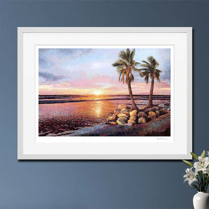 Fine Art print  Sunset by The Sea by Theo Michael, an oil painting featuring a vibrant sunset of orange, pink and yellow, displayed with mount and white frame.