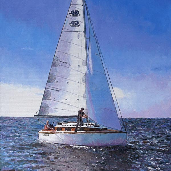 Sailboat on the water with a clear blue sky